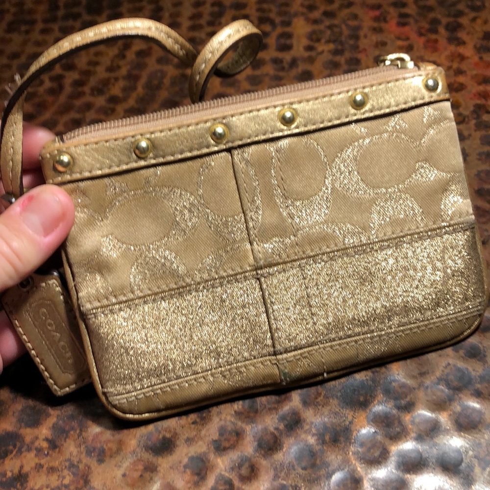 Coach gold signature C decorative bling wristlet